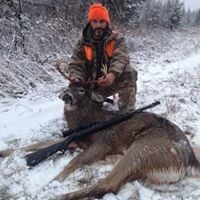 Man with Hunted Down Deer