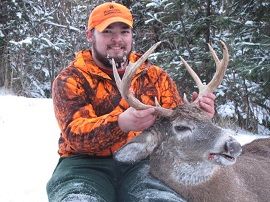 Man with Hunted Down White Tail Deer