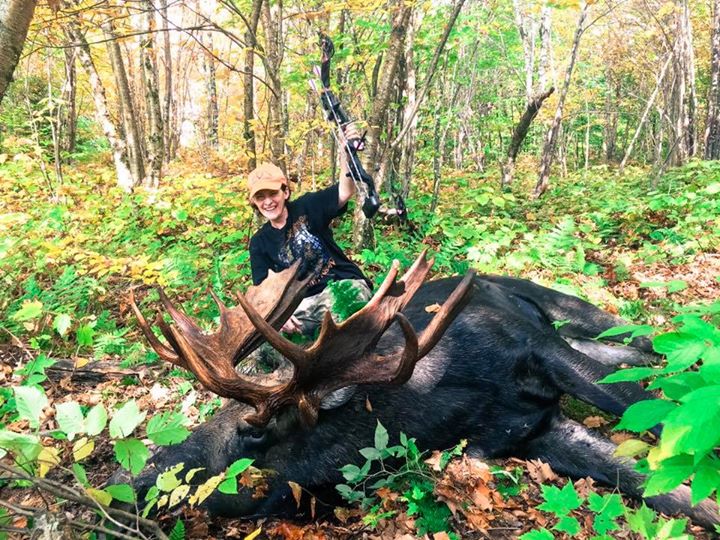 Women with Hunted Down Moose